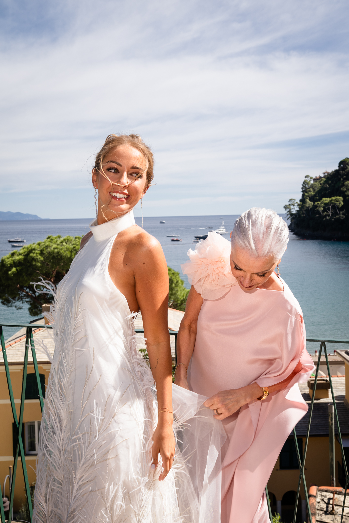 Elegant wedding in Portofino, with a view of the Ligurian bay, celebration at the historic Vesta Portofino by Dolce & Gabbana venue, capturing the atmosphere of the Dolce Vita and the Italian Riviera, bride getting ready with mum