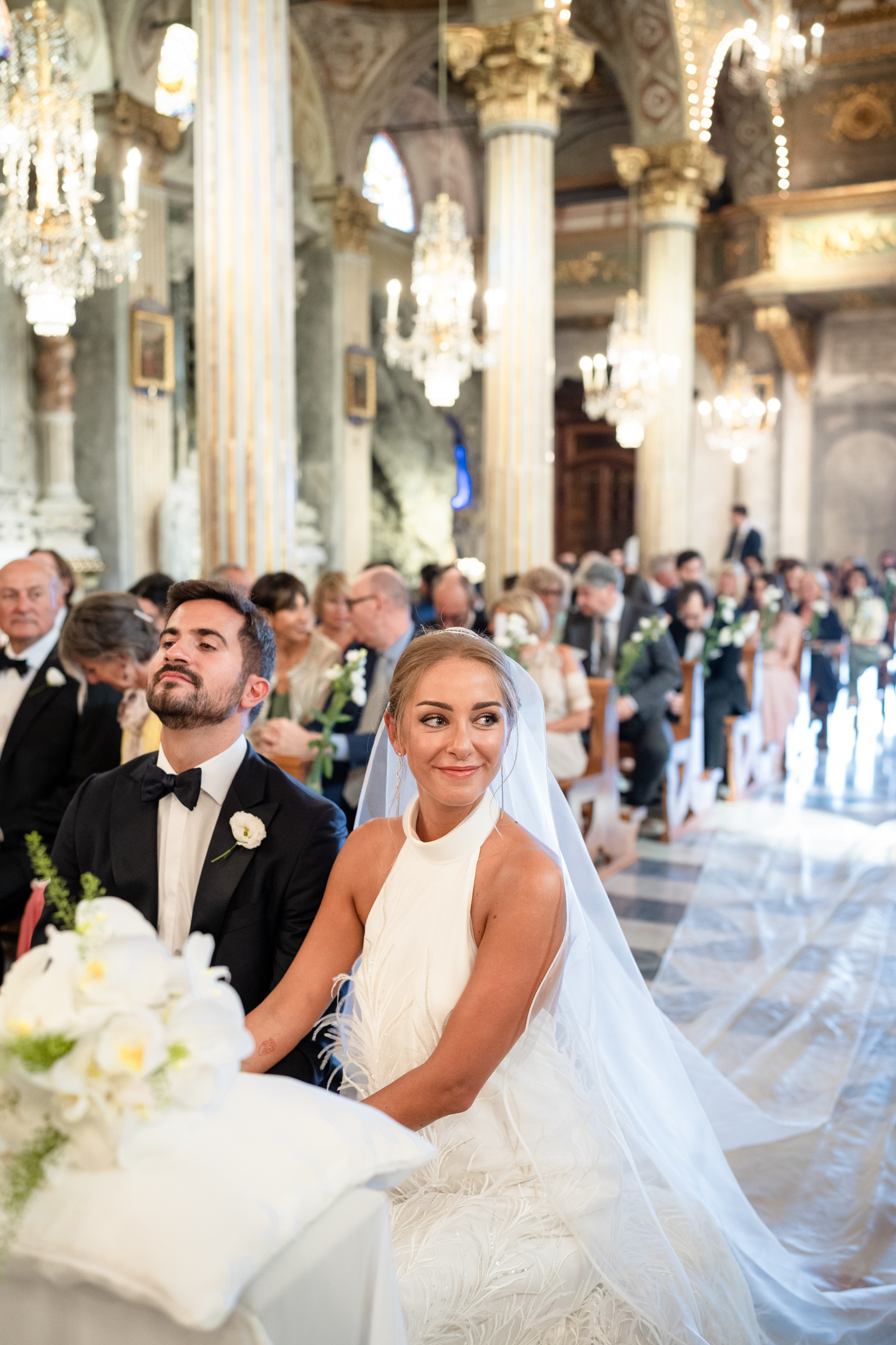 Elegant wedding in Portofino, with a view of the Ligurian bay, celebration at the historic Vesta Portofino by Dolce & Gabbana venue, capturing the atmosphere of the Dolce Vita and the Italian Riviera, bride with groom during the cerimony