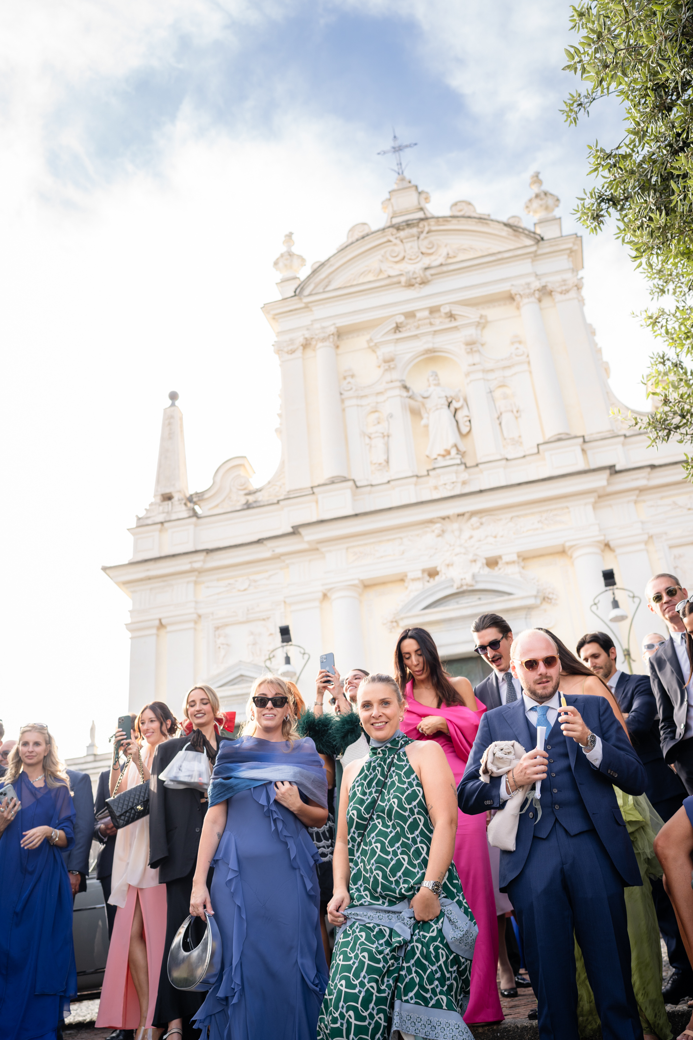 Elegant wedding in Portofino, with a view of the Ligurian bay, celebration at the historic Vesta Portofino by Dolce & Gabbana venue, capturing the atmosphere of the Dolce Vita and the Italian Riviera, guests going to the aperitive