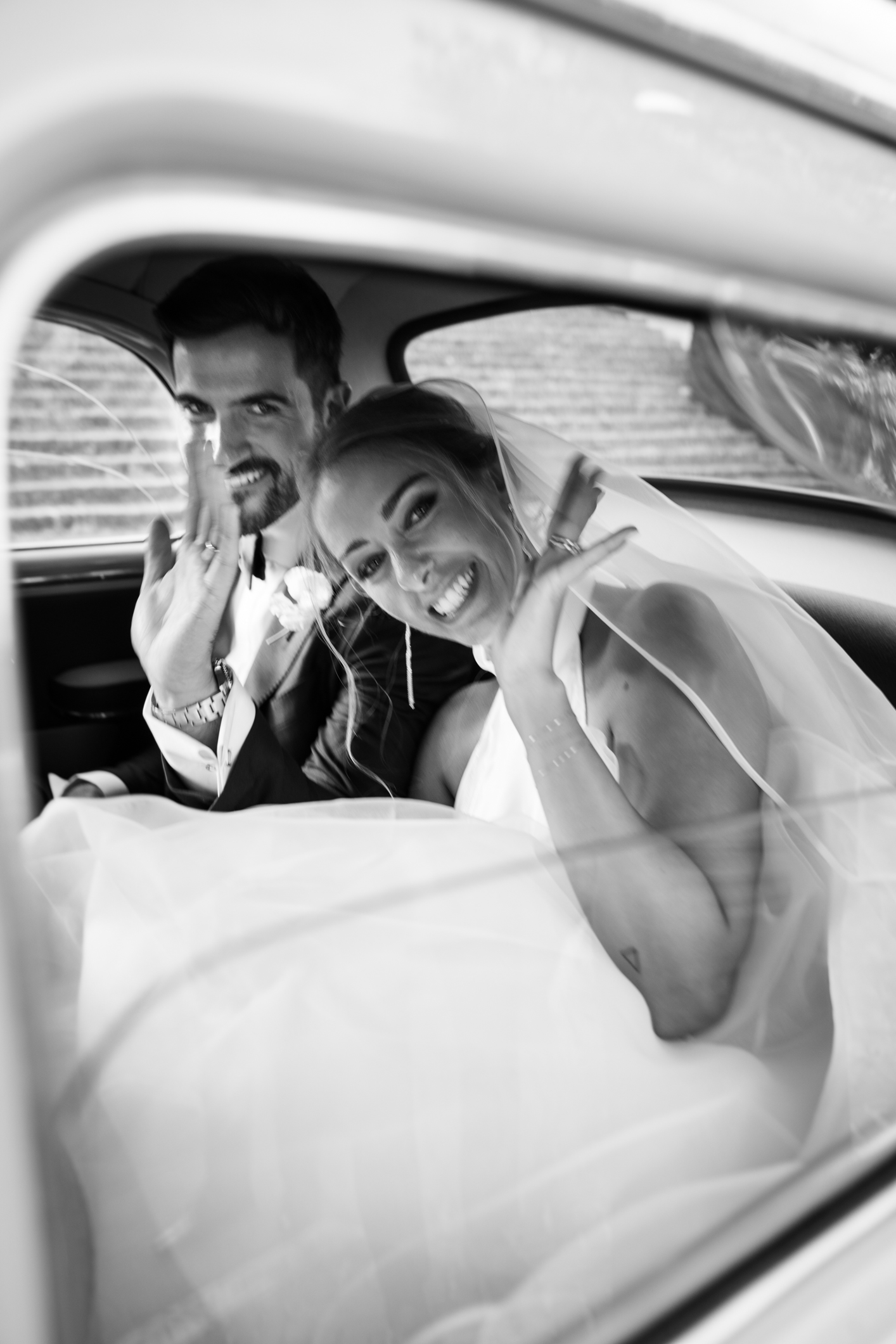 Elegant wedding in Portofino, with a view of the Ligurian bay, celebration at the historic Vesta Portofino by Dolce & Gabbana venue, capturing the atmosphere of the Dolce Vita and the Italian Riviera, bride and groom going to the aperitive by vintage car,timeless photo by Veronica Onofri