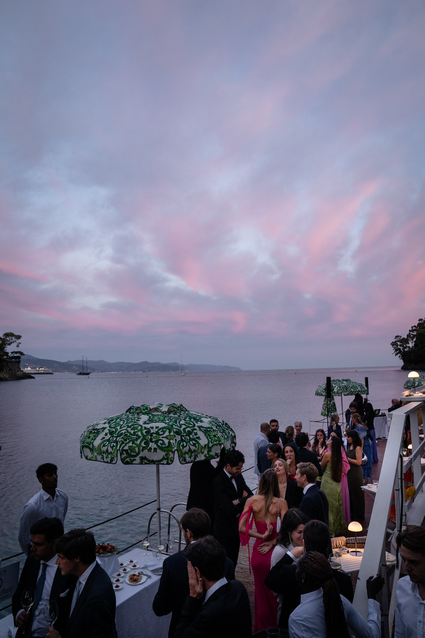 Elegant wedding in Portofino,  capturing the atmosphere of the Dolce Vita and the Italian Riviera, one of the most luxury venue in portofino, the Vesta Portofino by Dolce e Gabbana, sunset during the aperitive by the sea