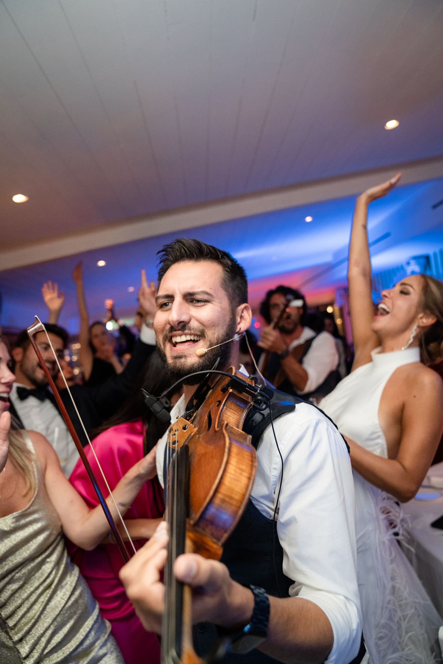 Elegant wedding in Portofino,  capturing the atmosphere of the Dolce Vita and the Italian Riviera, italin gipsy band playng during the dinner in one of the most luxury venue in portofino, the Vesta Portofino by Dolce e Gabbana